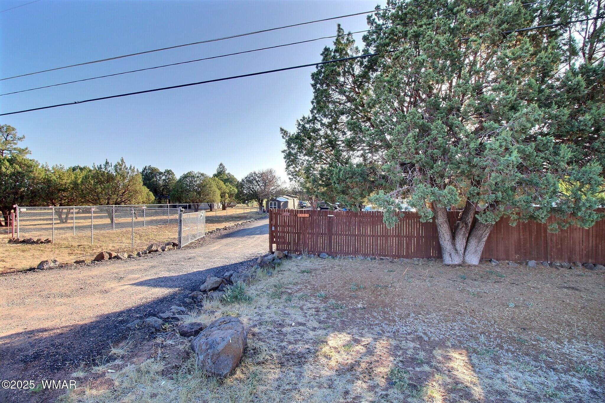 4134 Porter Mountain Road Lakeside, AZ 85929 - Photo 37 of 43 Property has fencing all around and a gate for privacy.