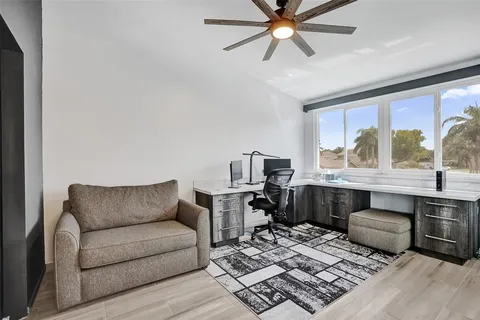 a living room with furniture and a window