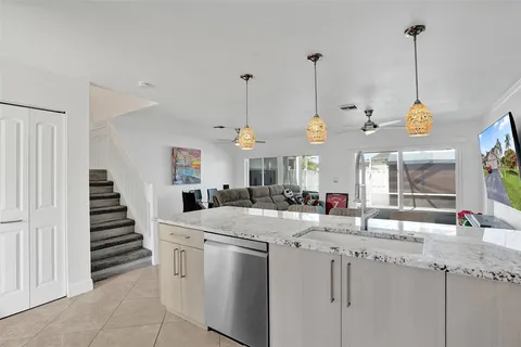 a view of kitchen and sink