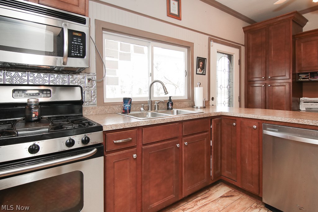 38960 Detroit Road Avon, OH 44011 - Photo 11 of 27 Modern kitchen with newer cabinets and counters