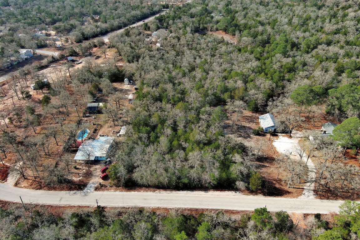 0 Short Street Bastrop, TX 78602 - Photo 6 of 19 a view of a yard with a tree