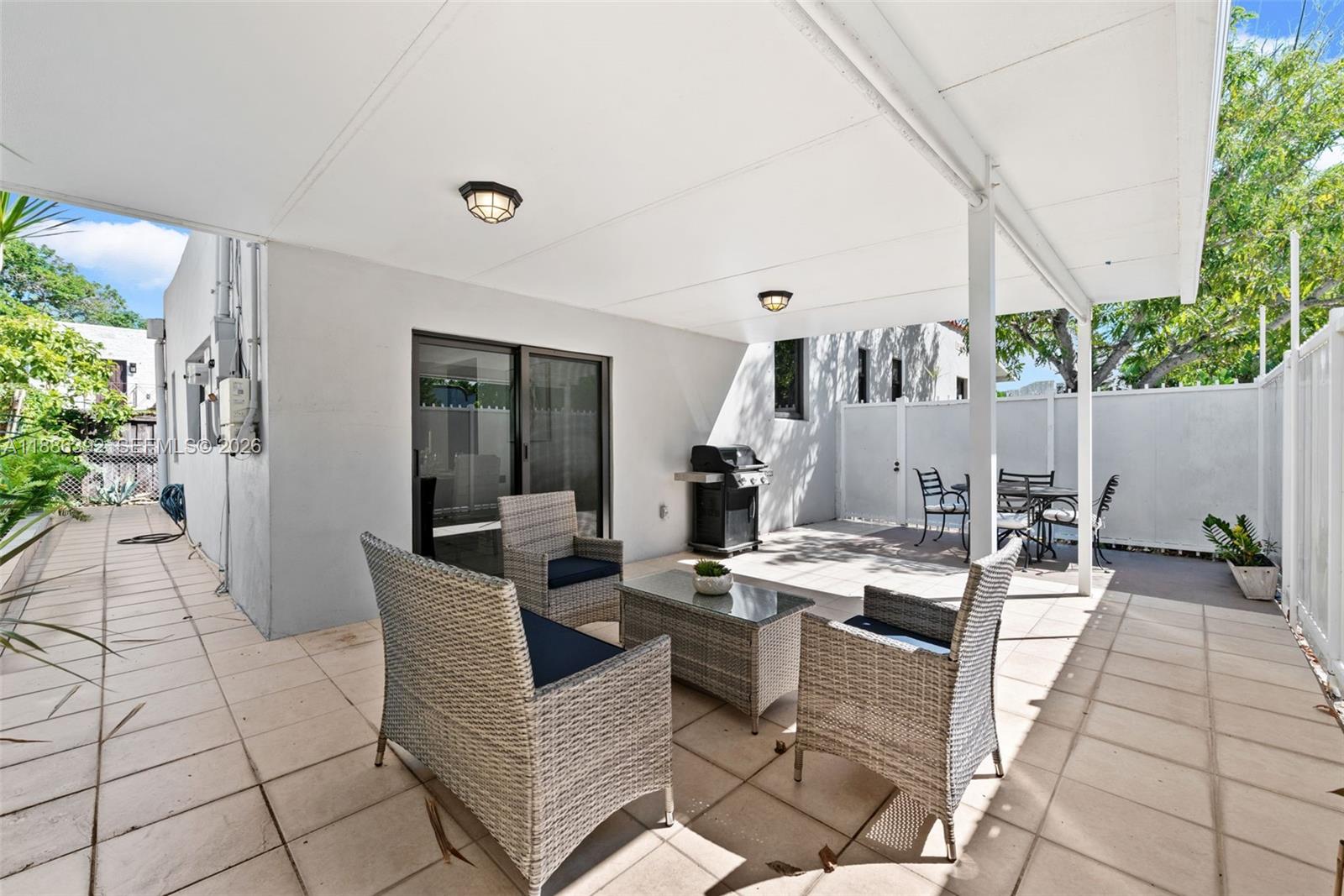 944 Southwest 10th Avenue Miami, FL 33130 - Photo 18 of 30 a view of the patio with couches and potted plants