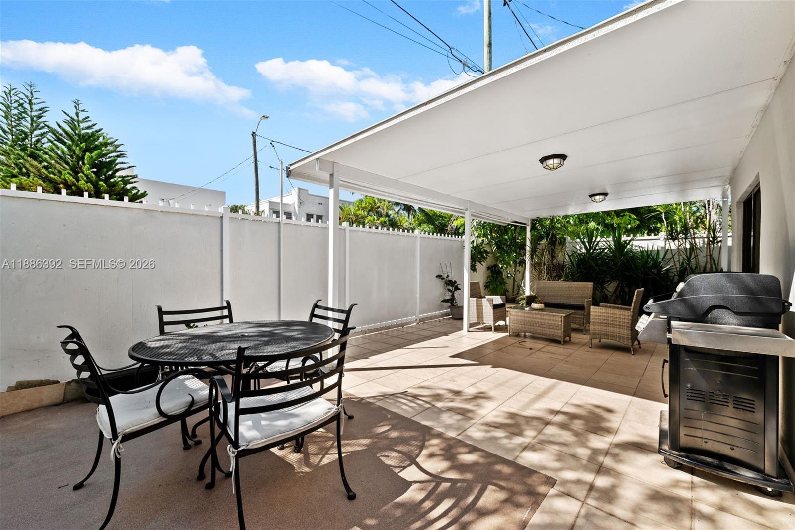 944 Southwest 10th Avenue Miami, FL 33130 - Photo 20 of 30 a building outdoor space with patio furniture and potted plants