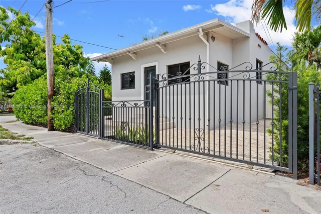 a front view of a house with a garage