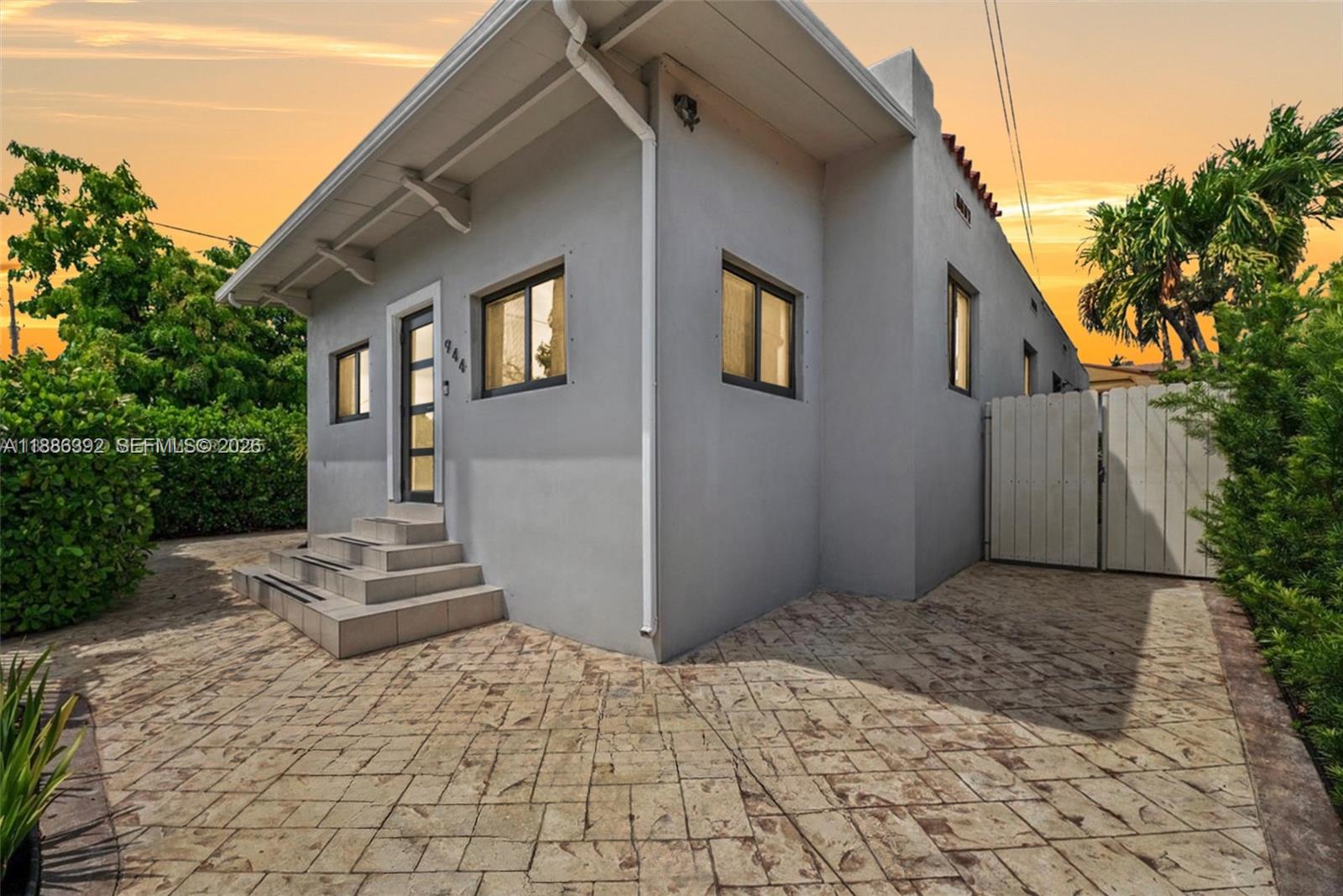 944 Southwest 10th Avenue Miami, FL 33130 - Photo 24 of 30 a front view of a house with a yard