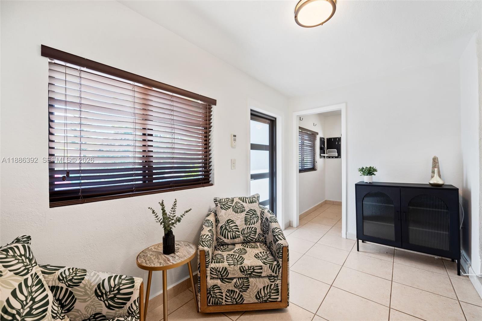 944 Southwest 10th Avenue Miami, FL 33130 - Photo 4 of 30 a very nice looking room with a large window