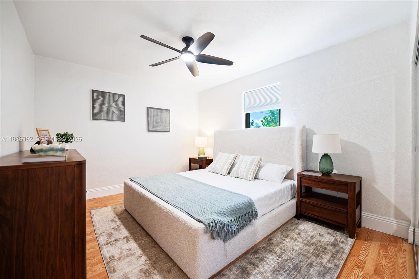 944 Southwest 10th Avenue Miami, FL 33130 - Photo 5 of 30 a bedroom with a bed and a dresser