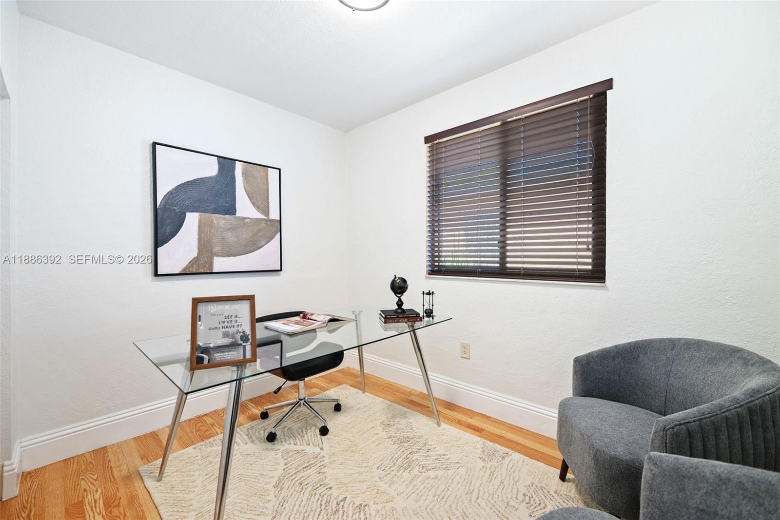 944 Southwest 10th Avenue Miami, FL 33130 - Photo 7 of 30 a bedroom with furniture and a window