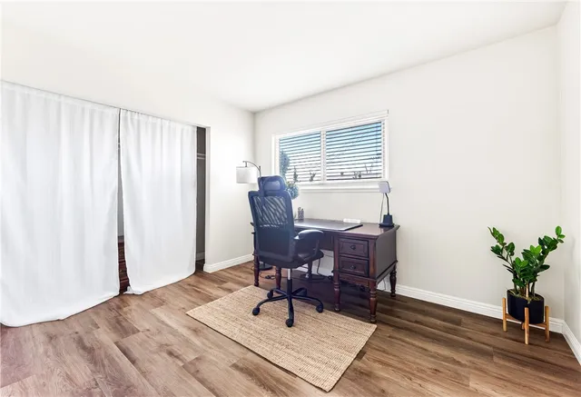 a workspace with furniture and window