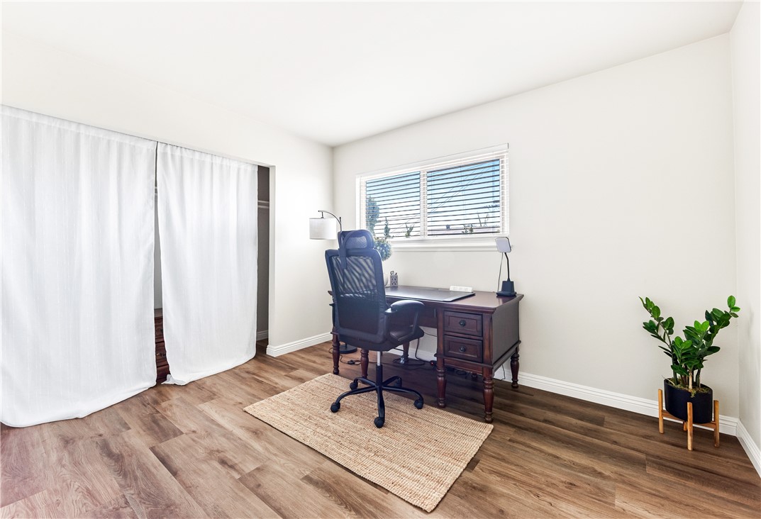 10191 Virgil Circle Cypress, CA 90630 - Photo 33 of 53 a workspace room with furniture and wooden floor