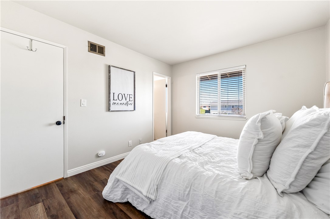 10191 Virgil Circle Cypress, CA 90630 - Photo 39 of 53 a bedroom with a bed and a window