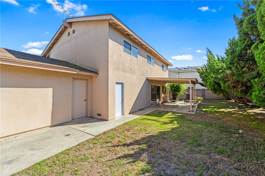 10191 Virgil Circle Cypress, CA 90630 - Photo 47 of 53 a view of a house with backyard and sitting area