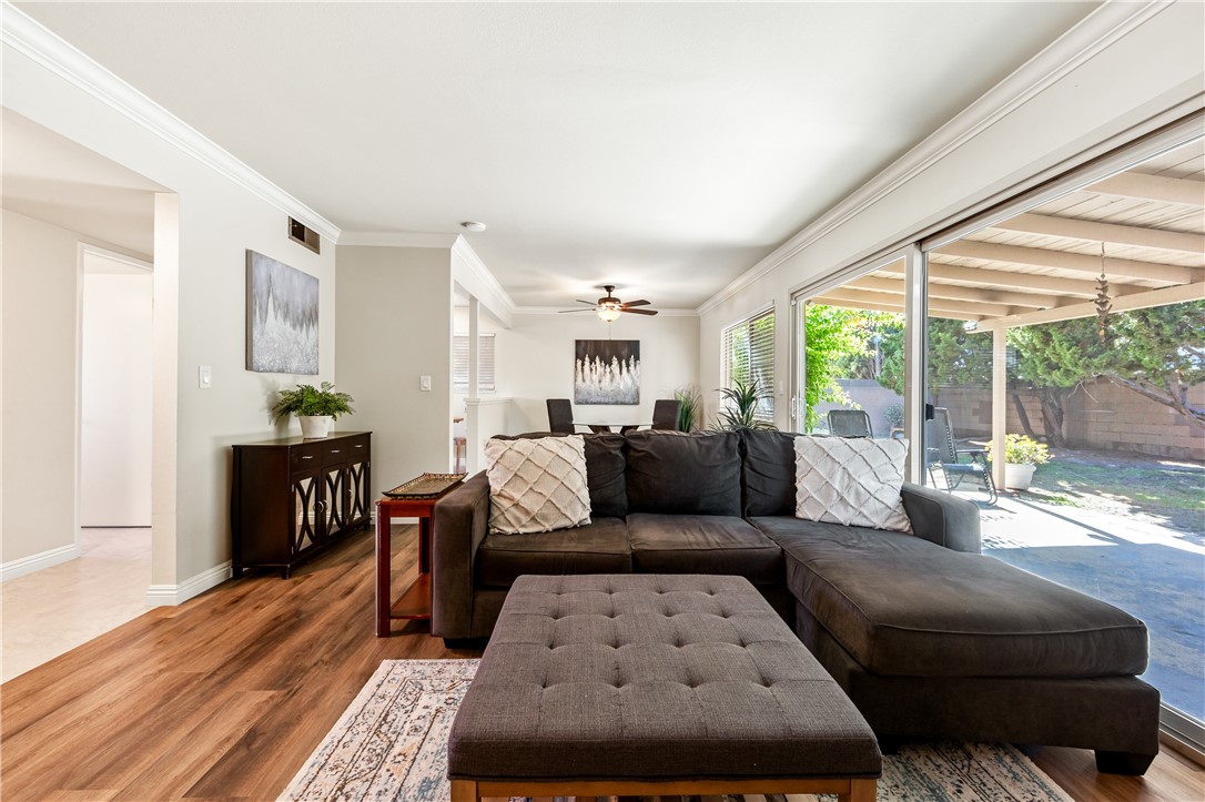 10191 Virgil Circle Cypress, CA 90630 - Photo 5 of 53 a living room with furniture and a wooden floor