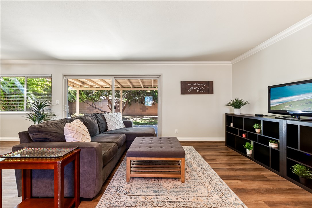 10191 Virgil Circle Cypress, CA 90630 - Photo 6 of 53 a living room with furniture and a flat screen tv
