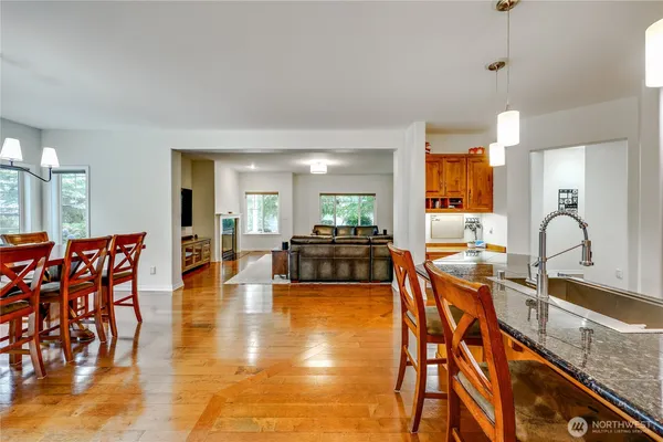 a lobby with furniture and wooden floor