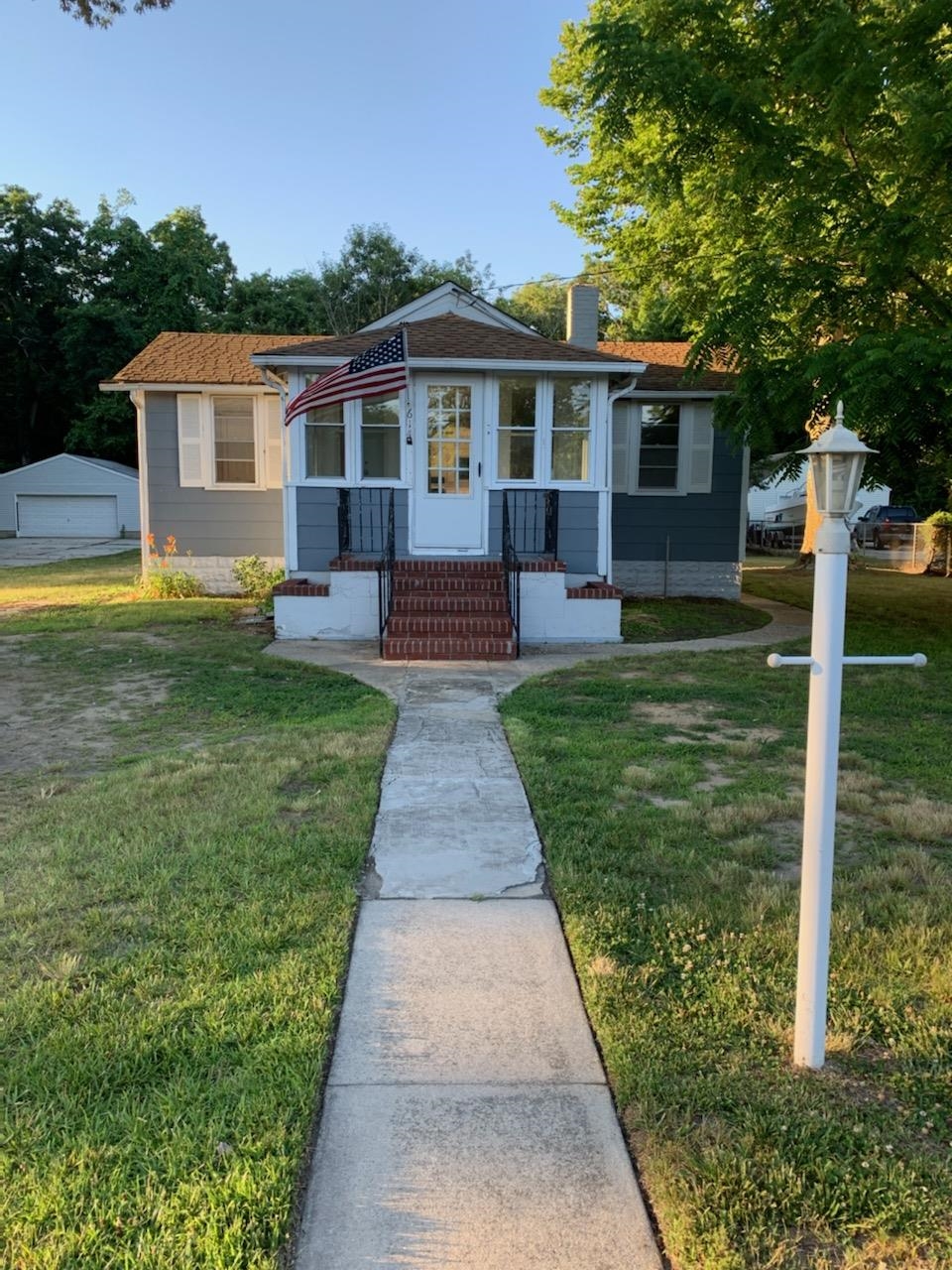 611 Breakwater Road Erma, NJ 08204 - Photo 1 of 12 a front view of a house with a yard
