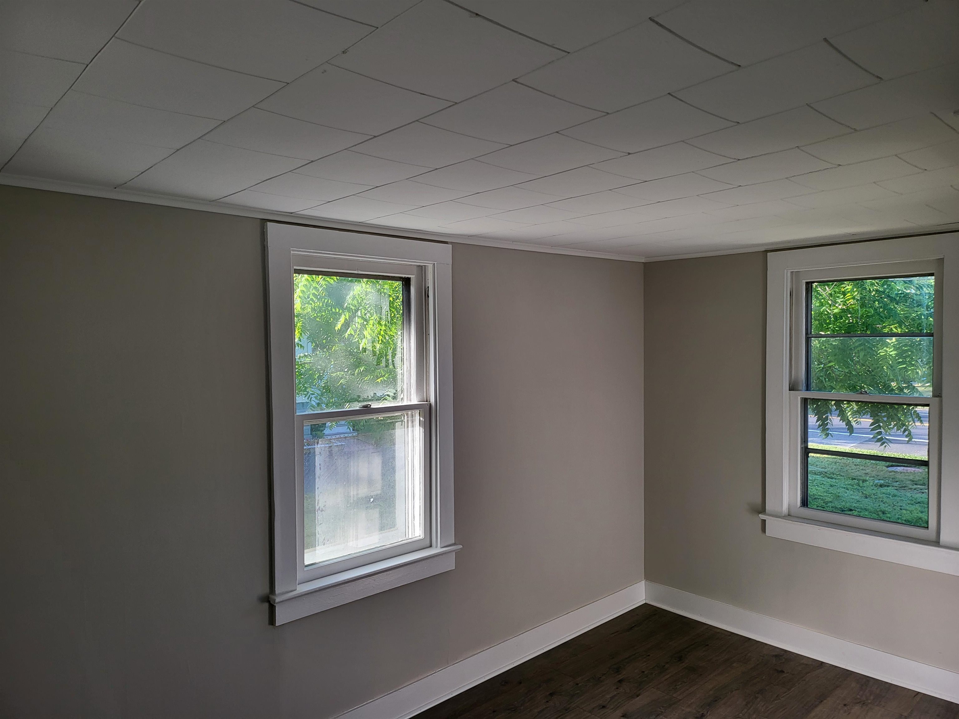611 Breakwater Road Erma, NJ 08204 - Photo 8 of 12 an empty room with wooden floor and windows