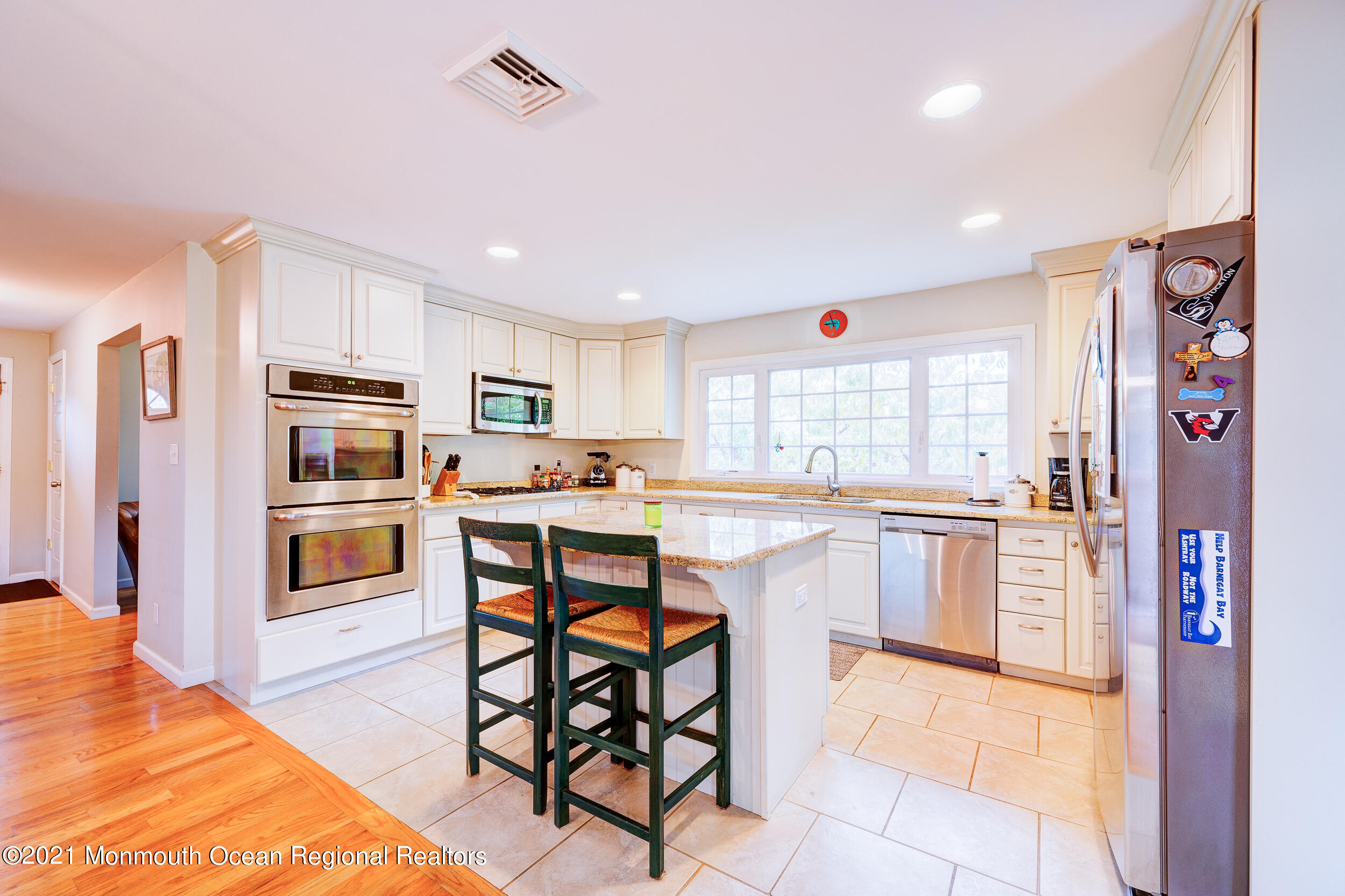 314 Sudbury Road Point Pleasant, NJ 08742 - Photo 12 of 21 a kitchen with stainless steel appliances granite countertop a refrigerator and microwave