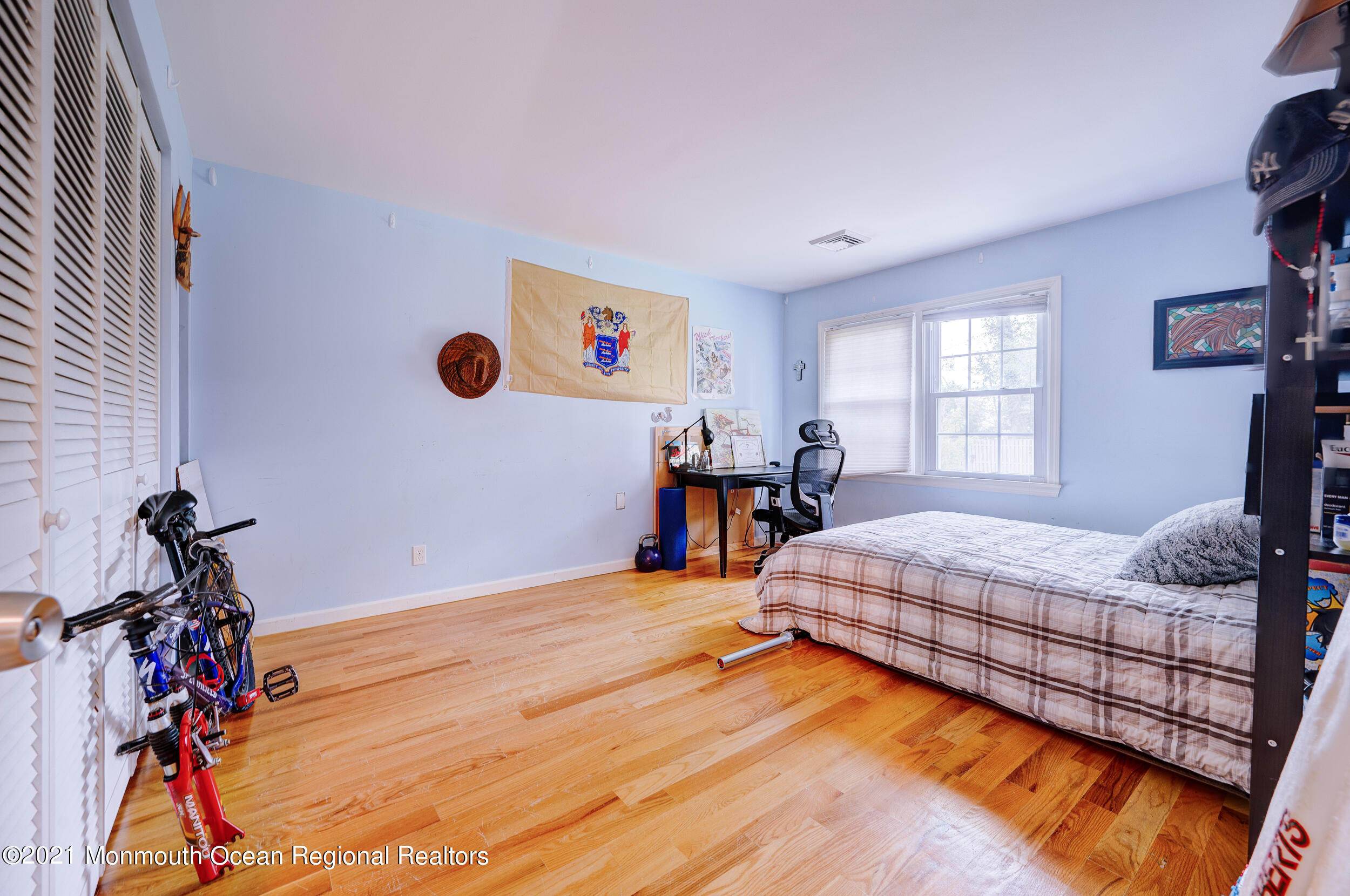 314 Sudbury Road Point Pleasant, NJ 08742 - Photo 16 of 21 a bedroom with a bed and a window