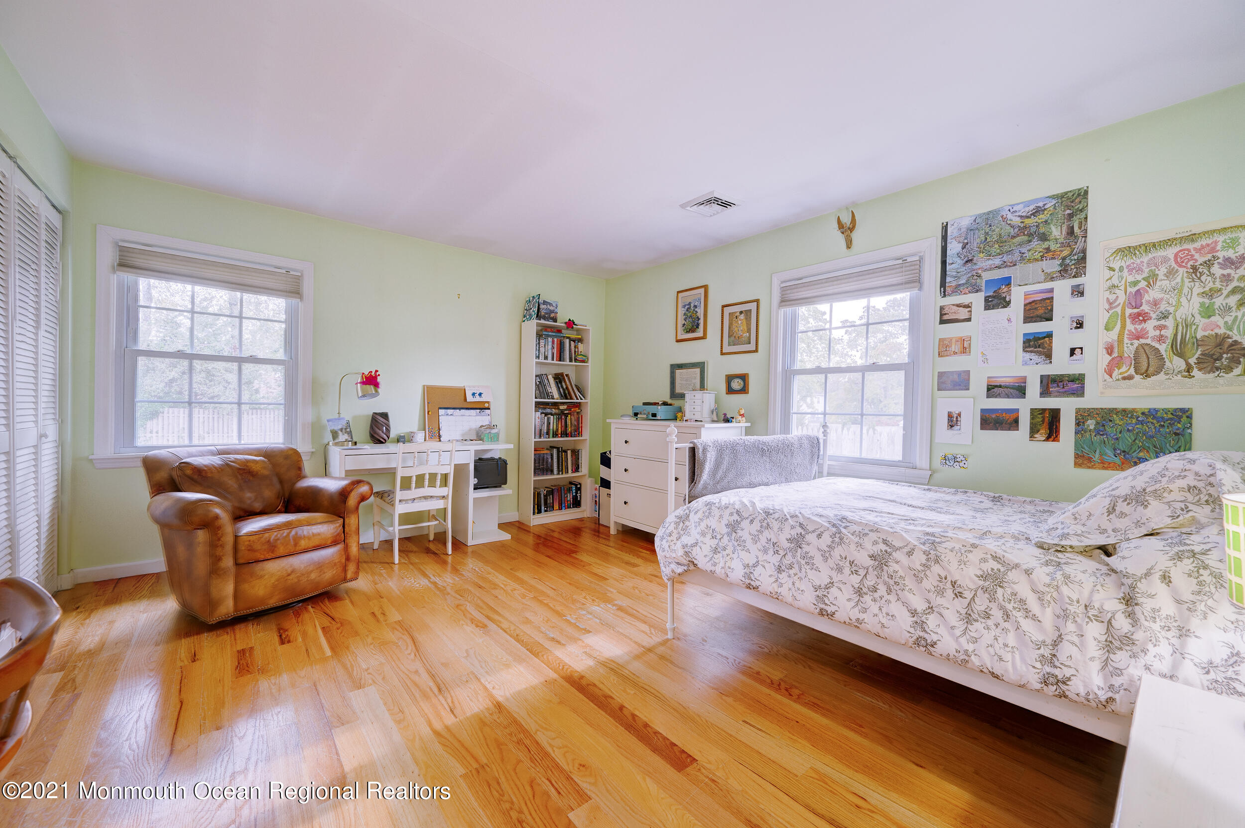 314 Sudbury Road Point Pleasant, NJ 08742 - Photo 17 of 21 a bedroom with a bed and a couch
