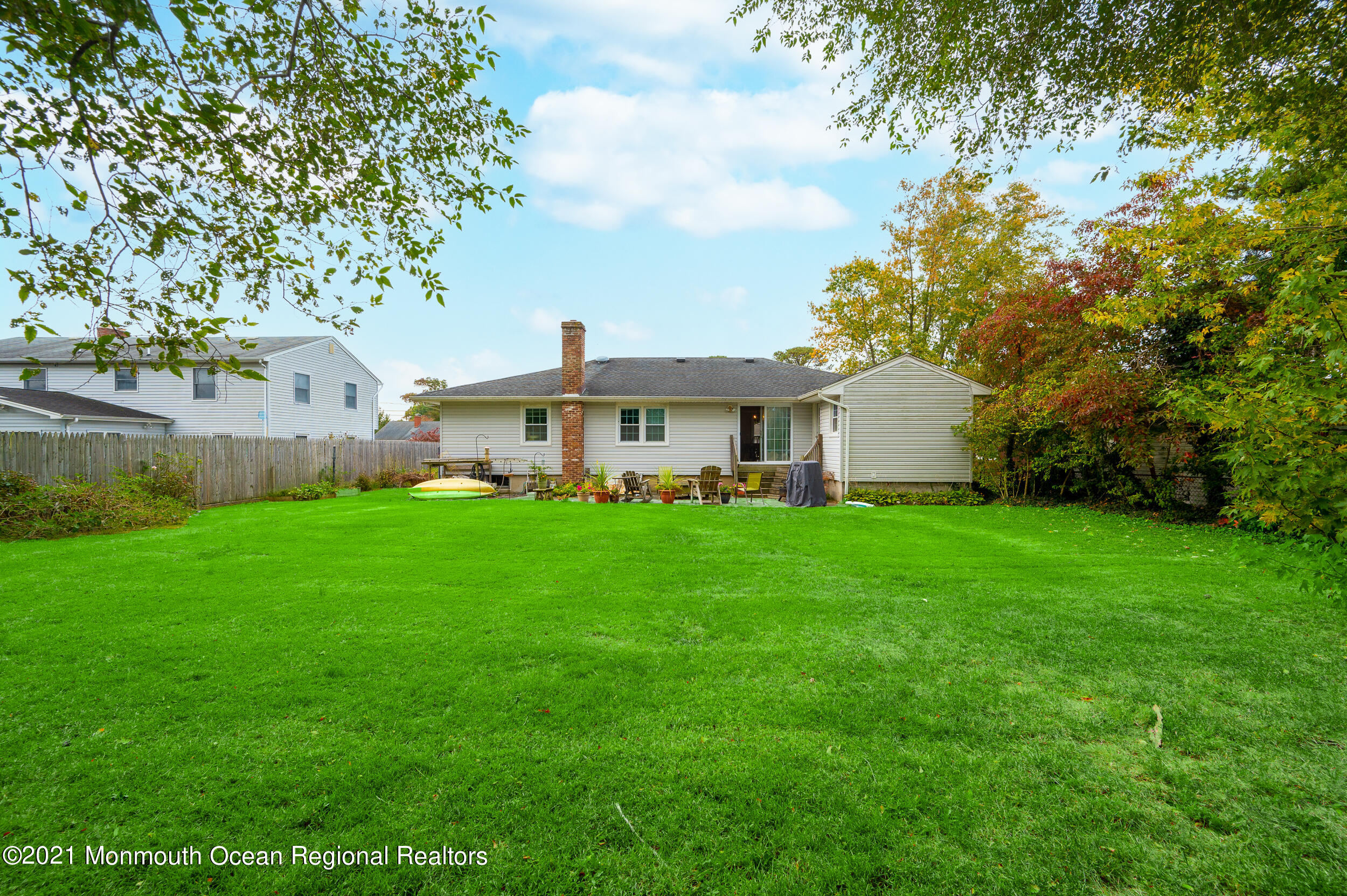 314 Sudbury Road Point Pleasant, NJ 08742 - Photo 20 of 21 a view of an house with backyard space and garden