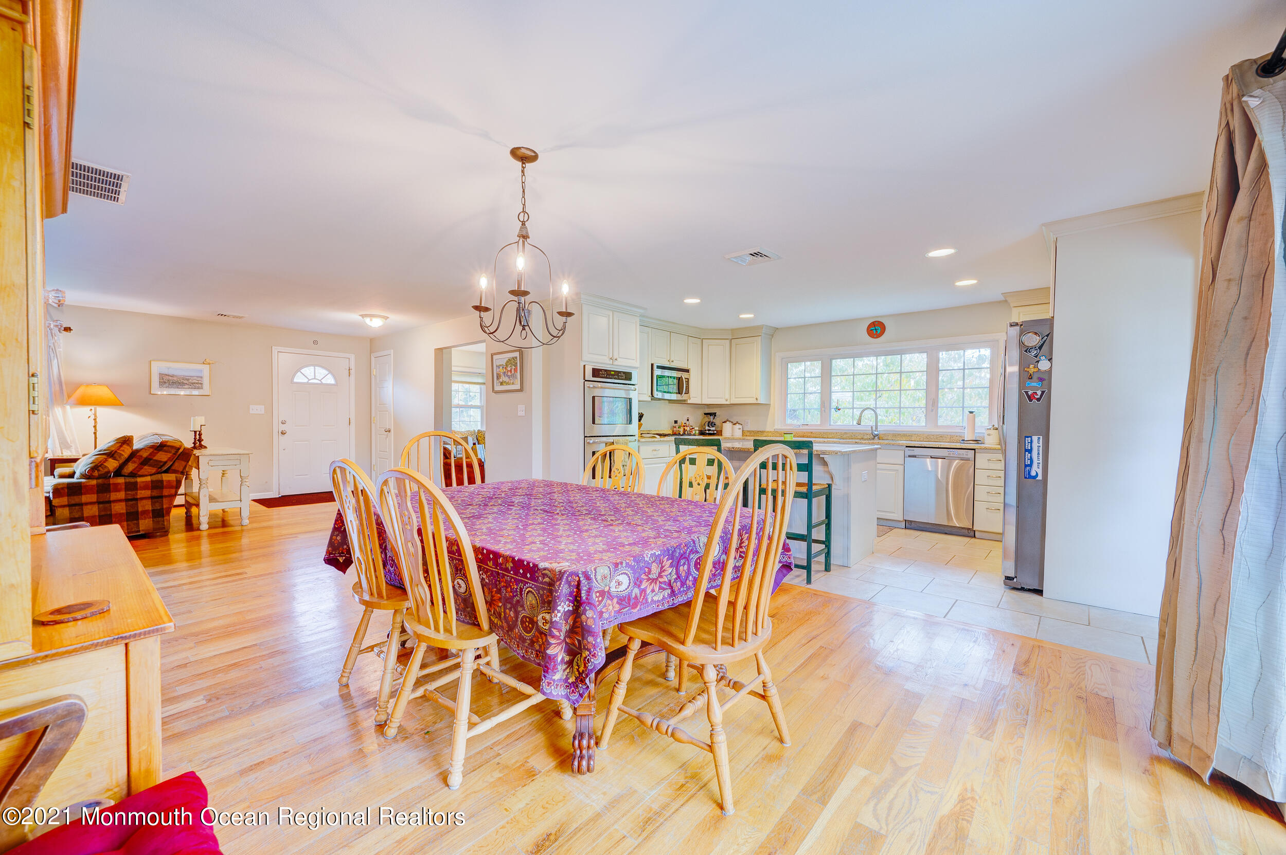 314 Sudbury Road Point Pleasant, NJ 08742 - Photo 10 of 21 a dining room with furniture and wooden floor