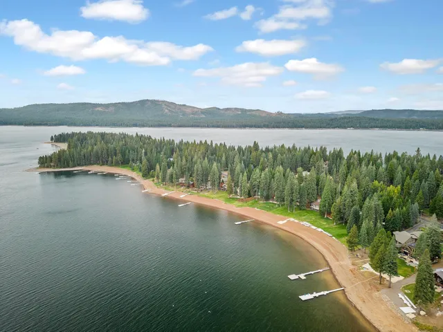a view of a lake with a yard