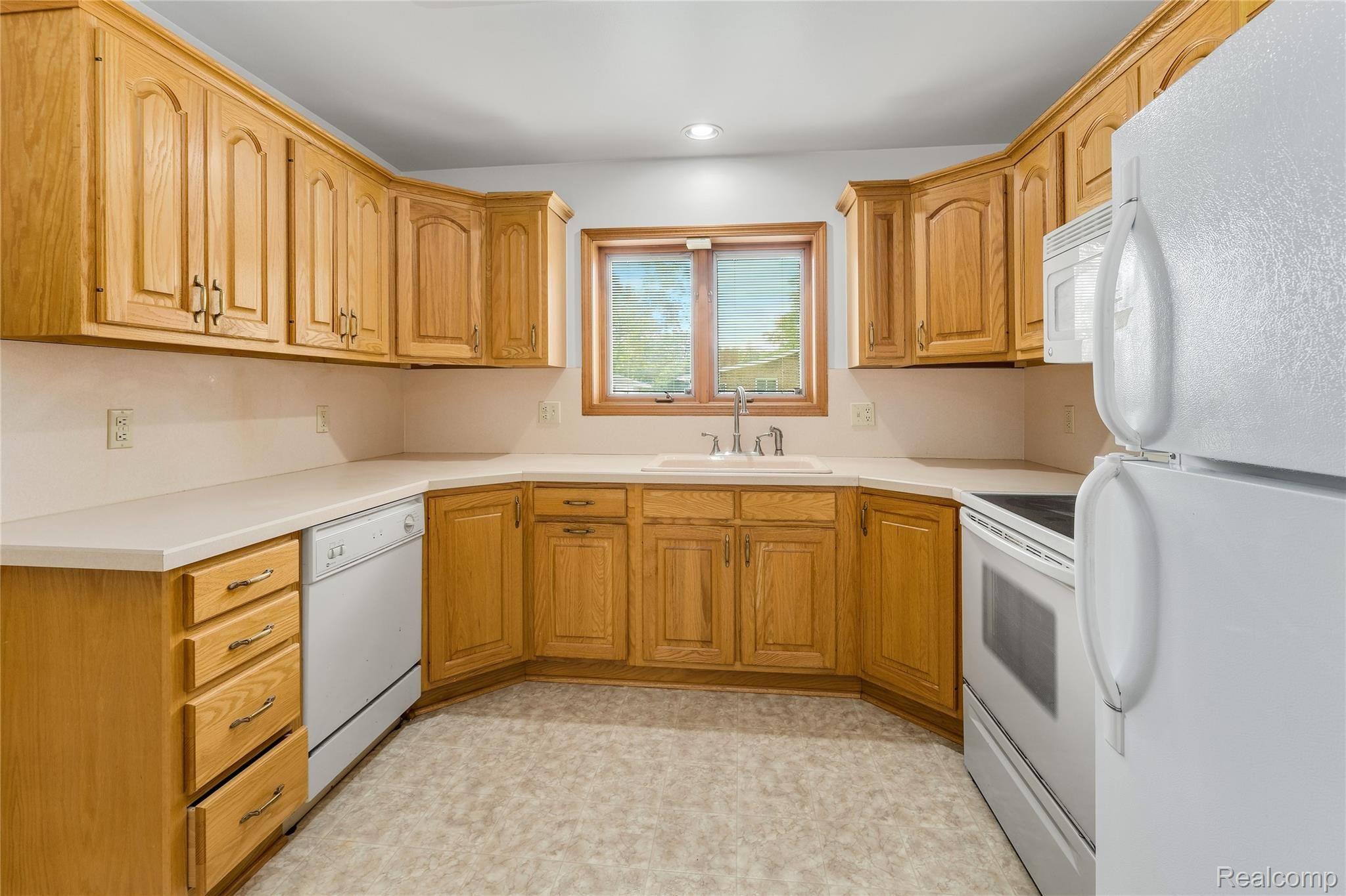 4593 Valley Road Trenton, MI 48183 - Photo 6 of 27 AN ABUNDANCE OF CABINETS AND COUNTER SPACE