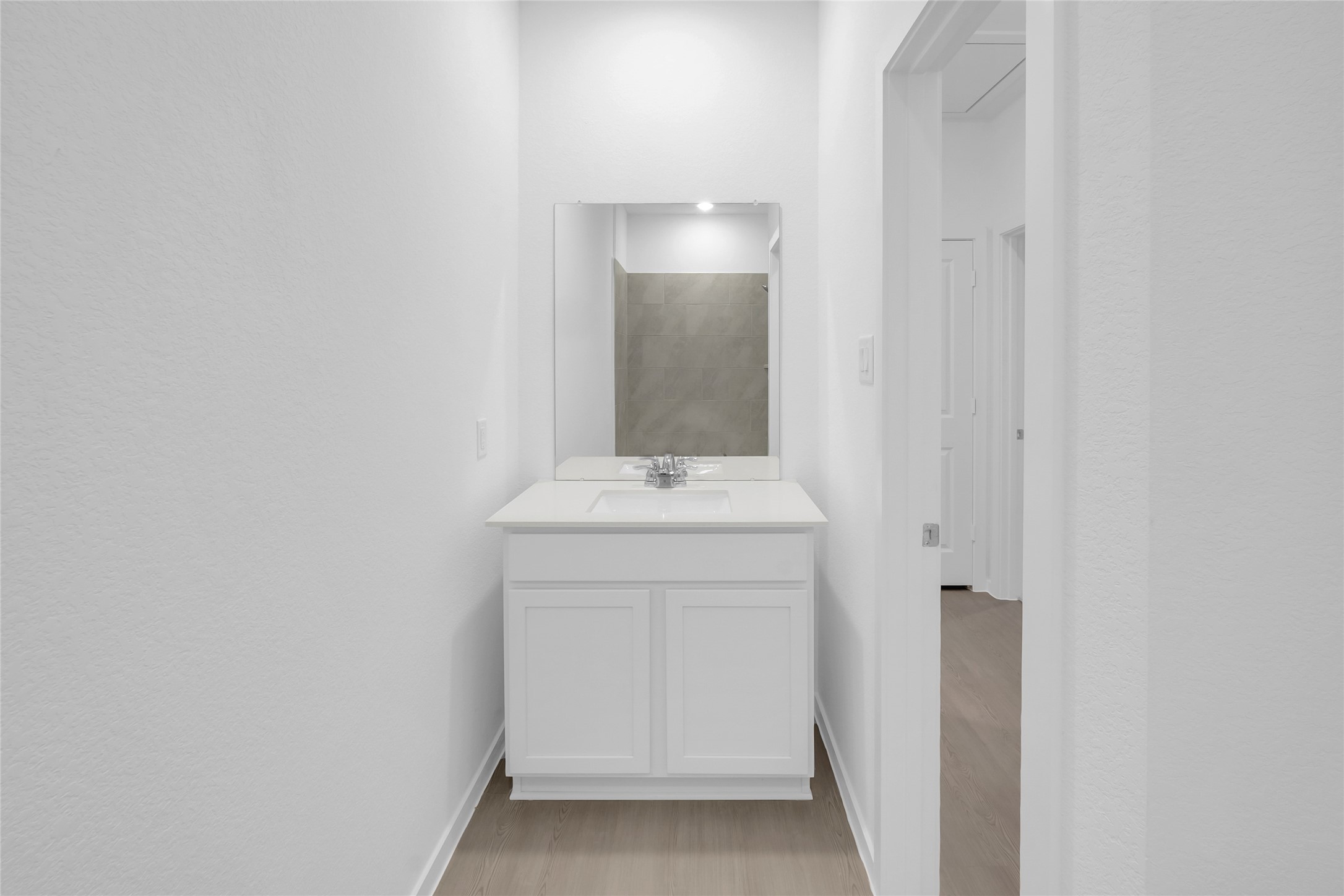 5437 Bear Run Bryan, TX 77807 - Photo 15 of 35 a bathroom with a sink and a mirror
