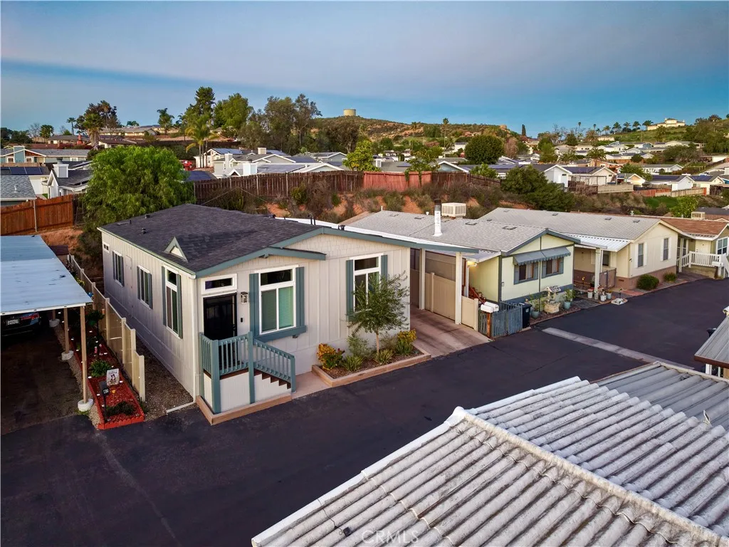 12530 Royal, Unit 46 El Cajon, CA 92021 - Photo 14 of 17 an aerial view of a house with a yard