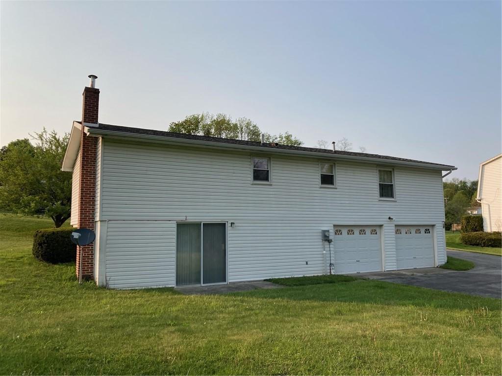 325 Owen Drive Johnstown, PA 15904 - Photo 15 of 15 a view of a house with backyard