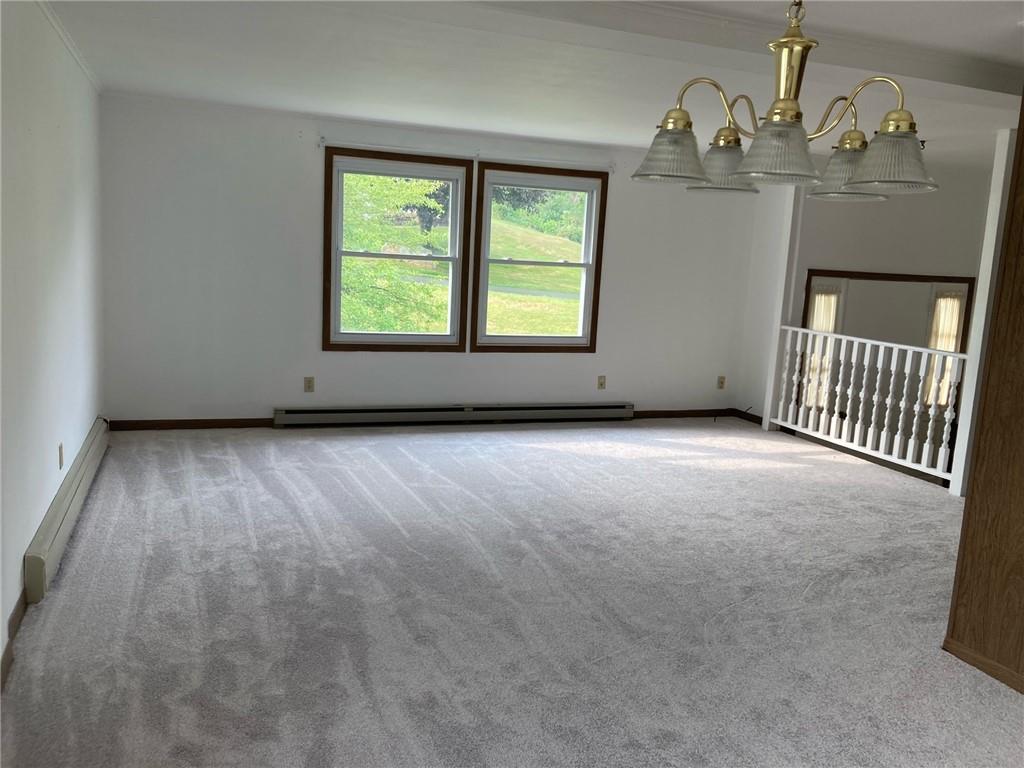 325 Owen Drive Johnstown, PA 15904 - Photo 2 of 15 an empty room with windows