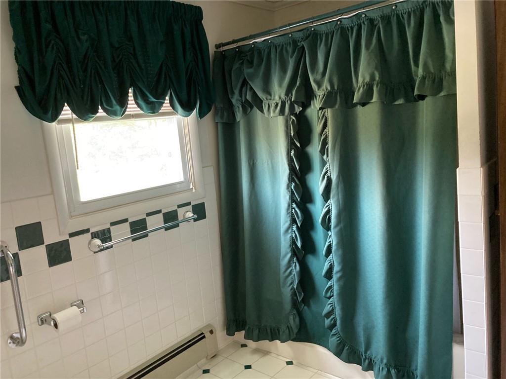 325 Owen Drive Johnstown, PA 15904 - Photo 9 of 15 a bathroom with a shower and a sink