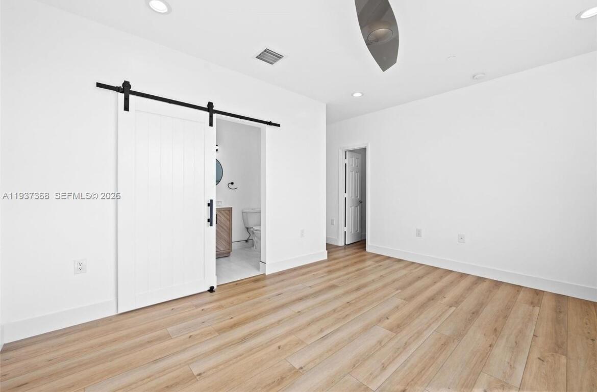 1705 Johnson Street, Unit B Hollywood, FL 33020 - Photo 15 of 34 a view of an empty room