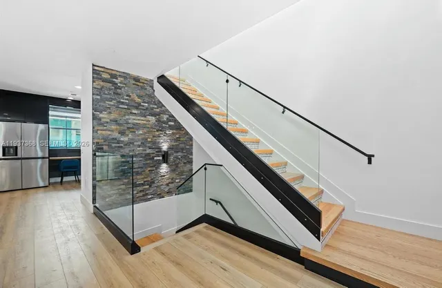 a view of entryway with stairs