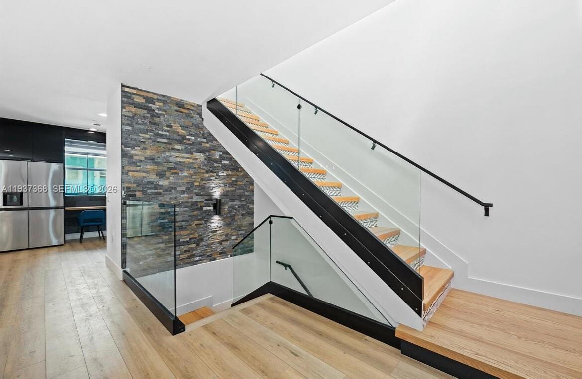 1705 Johnson Street, Unit B Hollywood, FL 33020 - Photo 3 of 34 a view of entryway with stairs