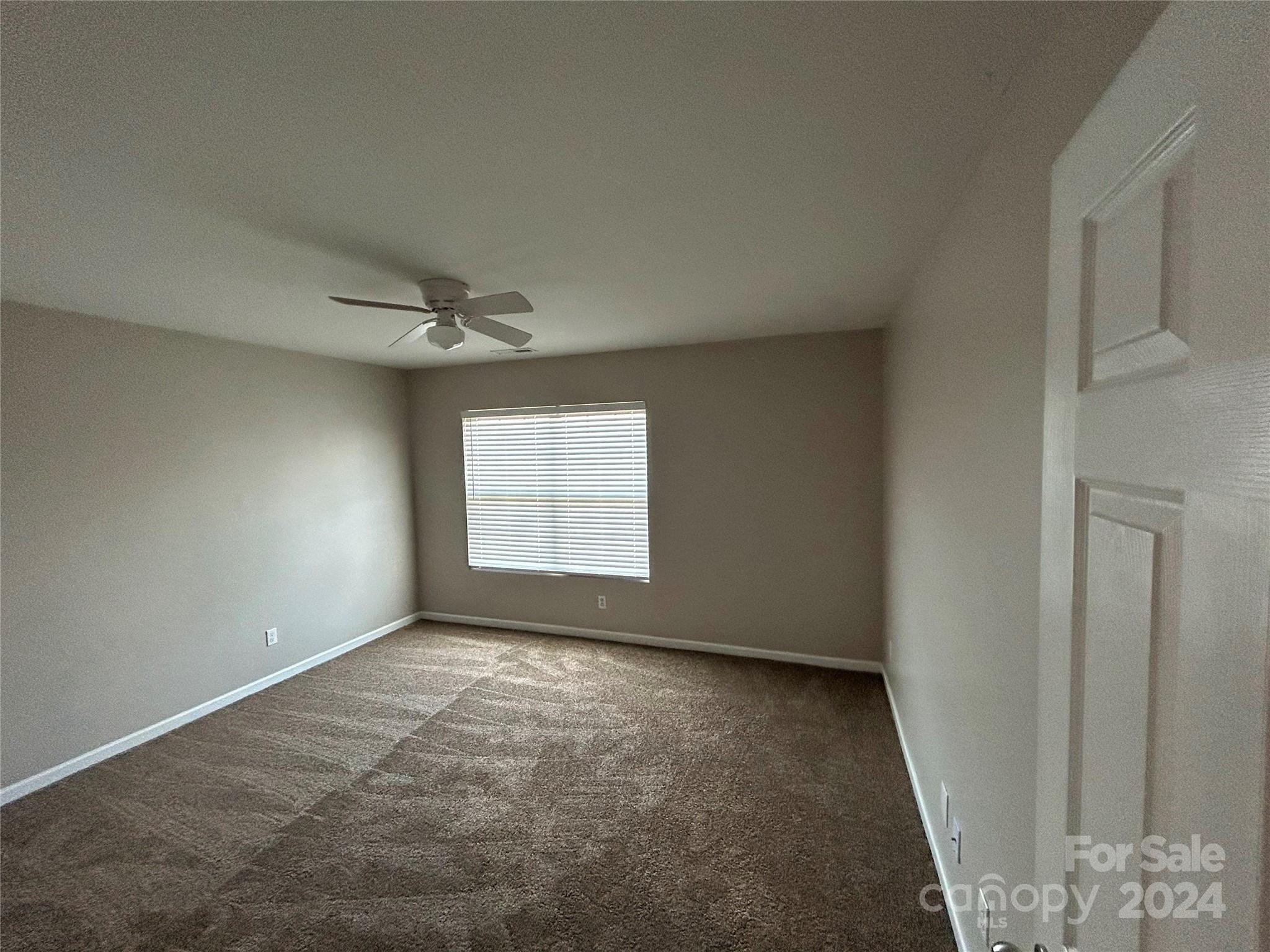 1012 Green Terra Road Indian Trail, NC 28079 - Photo 11 of 14 an empty room with windows