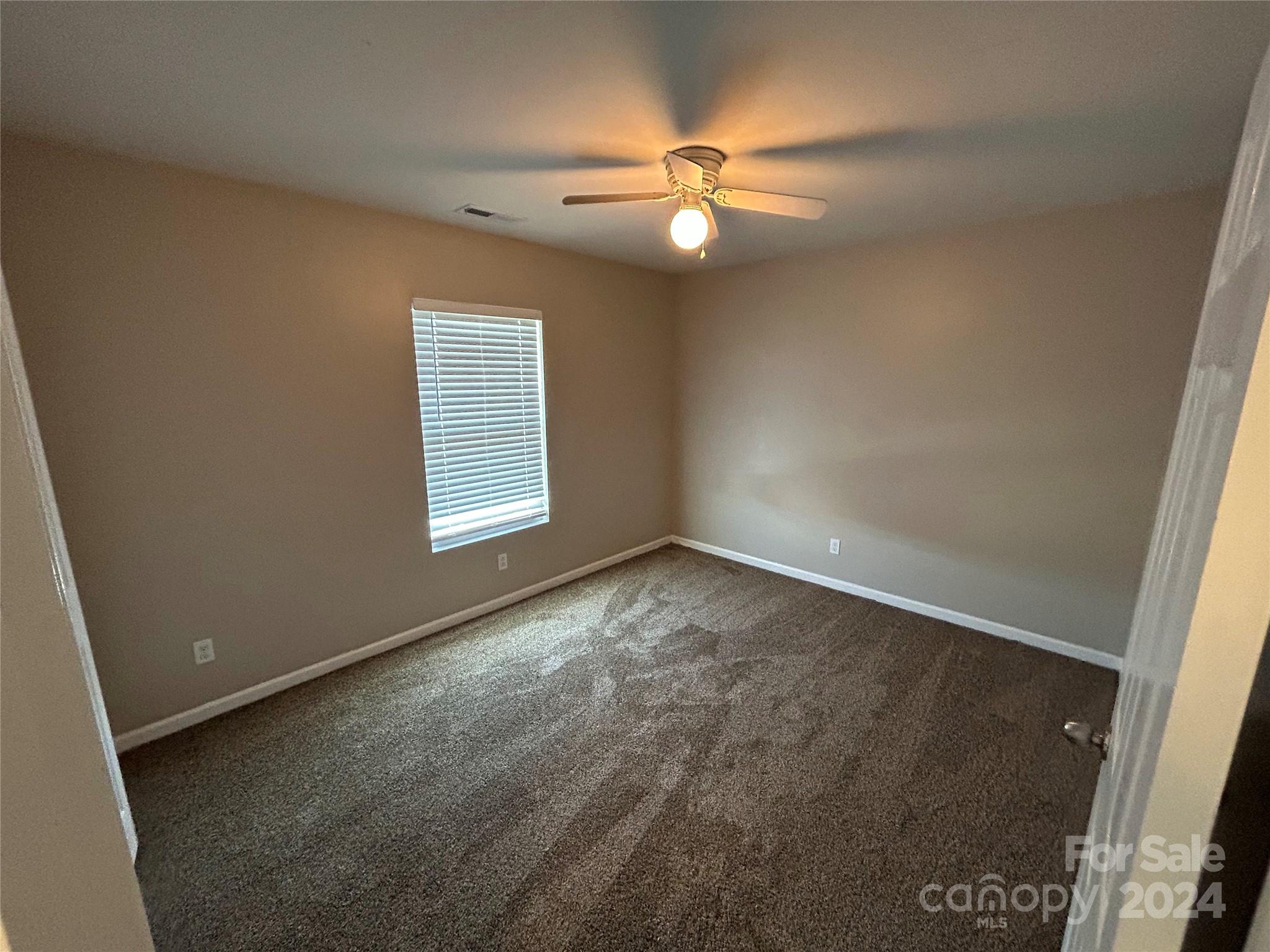 1012 Green Terra Road Indian Trail, NC 28079 - Photo 6 of 14 an empty room with a window