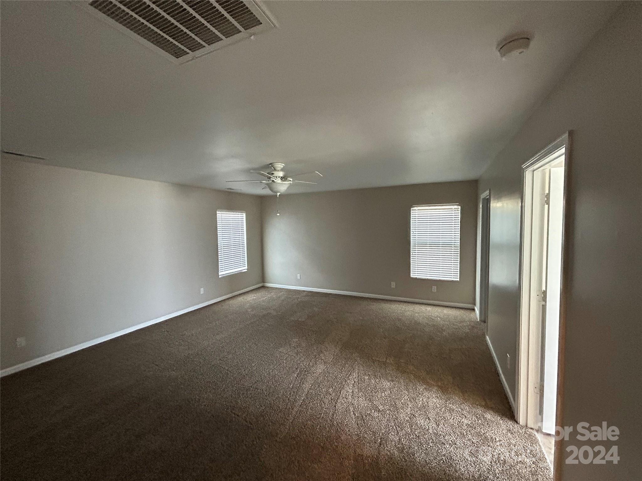 1012 Green Terra Road Indian Trail, NC 28079 - Photo 9 of 14 an empty room with windows