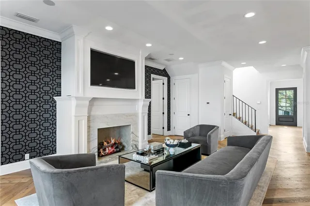 a view of a house with a swimming pool and porch