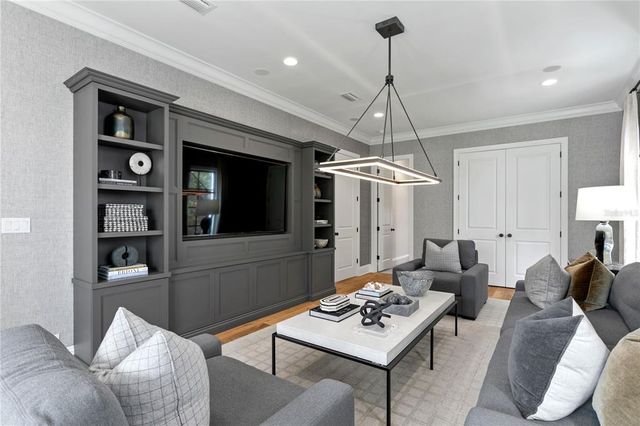 a view of a building with a yard