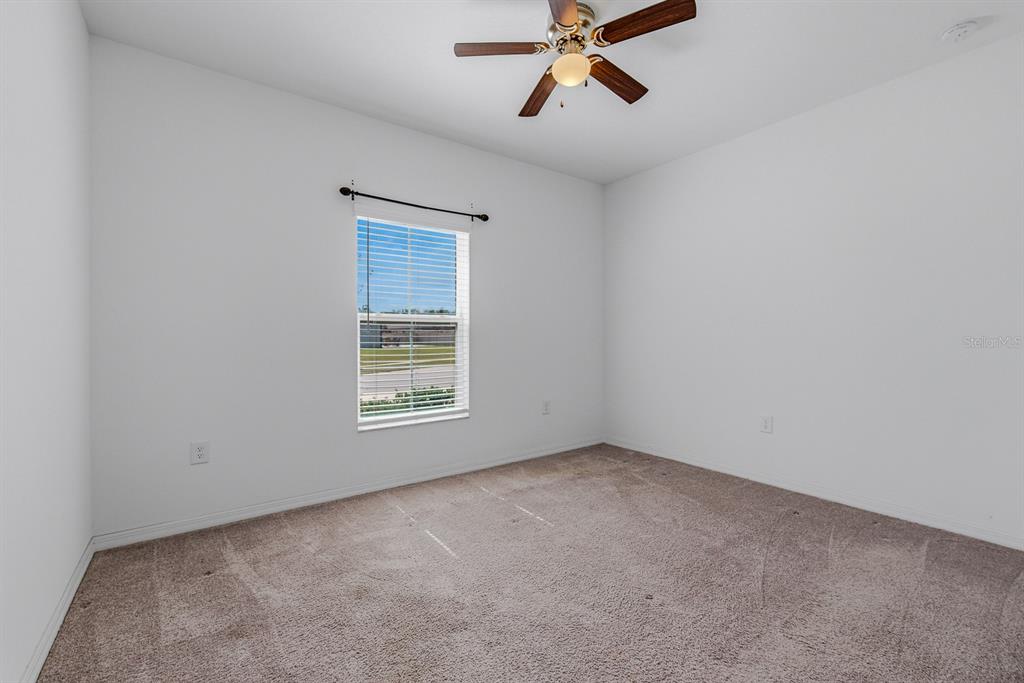 12218 Gothic Rd Spring Hill Spring Hill, FL 34610 - Photo 16 of 56 a view of an empty room with a window