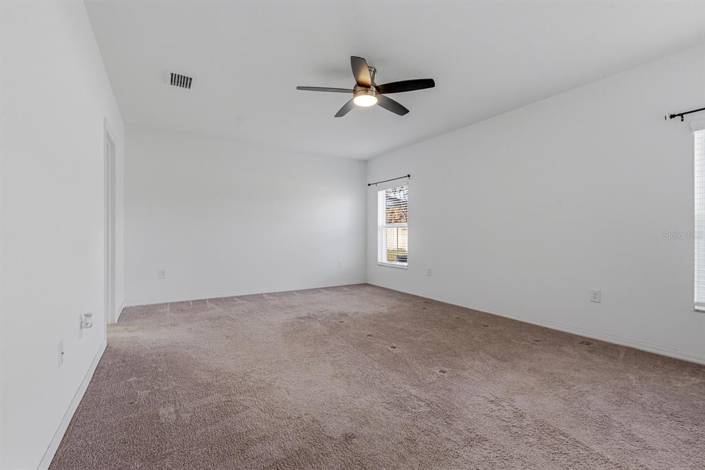12218 Gothic Rd Spring Hill Spring Hill, FL 34610 - Photo 20 of 56 a view of an empty room with a window