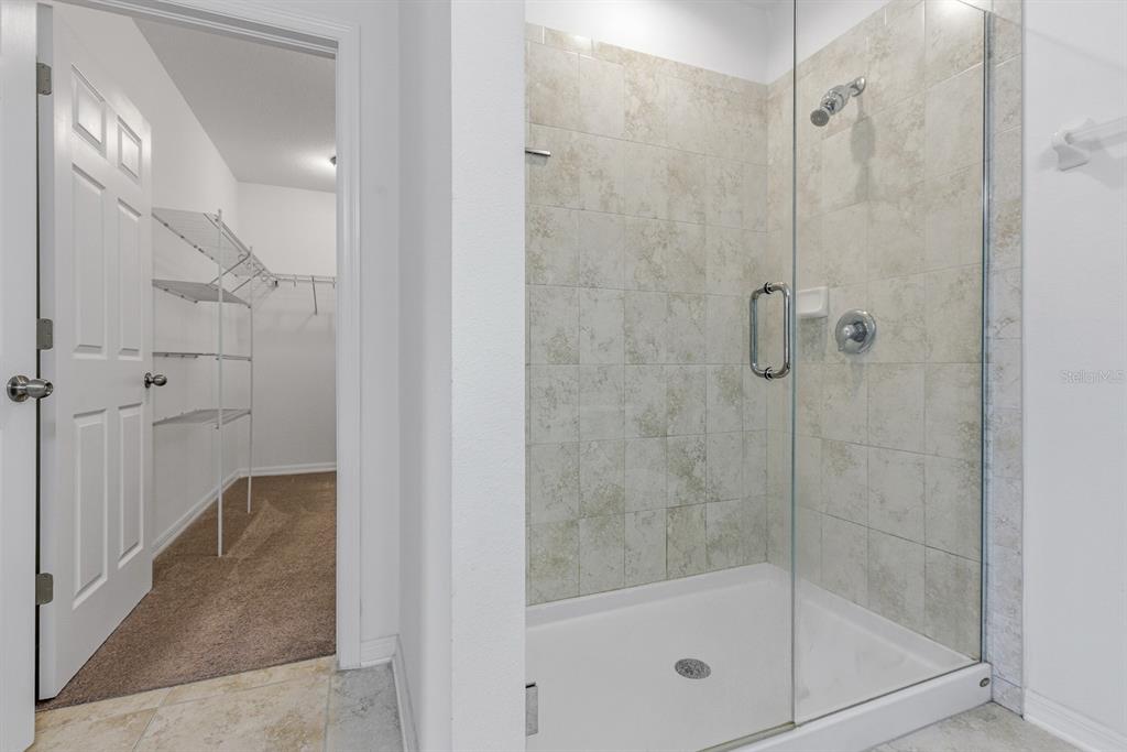 12218 Gothic Rd Spring Hill Spring Hill, FL 34610 - Photo 23 of 56 a bathroom with a shower