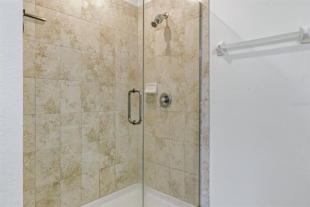 12218 Gothic Rd Spring Hill Spring Hill, FL 34610 - Photo 25 of 56 a bathroom with a shower