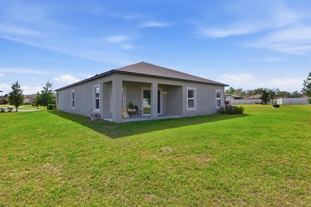 12218 Gothic Rd Spring Hill Spring Hill, FL 34610 - Photo 33 of 56 a view of a house with backyard and garden