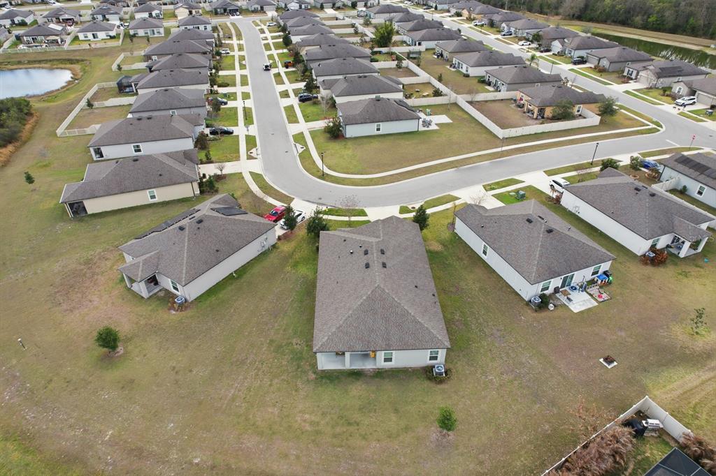 12218 Gothic Rd Spring Hill Spring Hill, FL 34610 - Photo 36 of 56 an aerial view of a house with a swimming pool