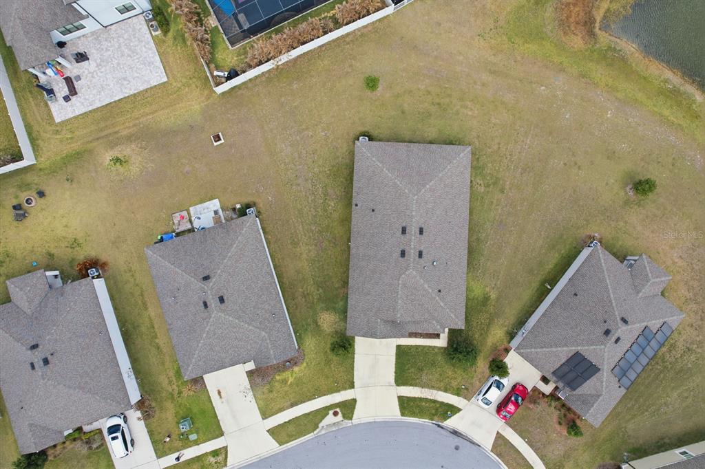 12218 Gothic Rd Spring Hill Spring Hill, FL 34610 - Photo 37 of 56 an aerial view of a house with swimming pool