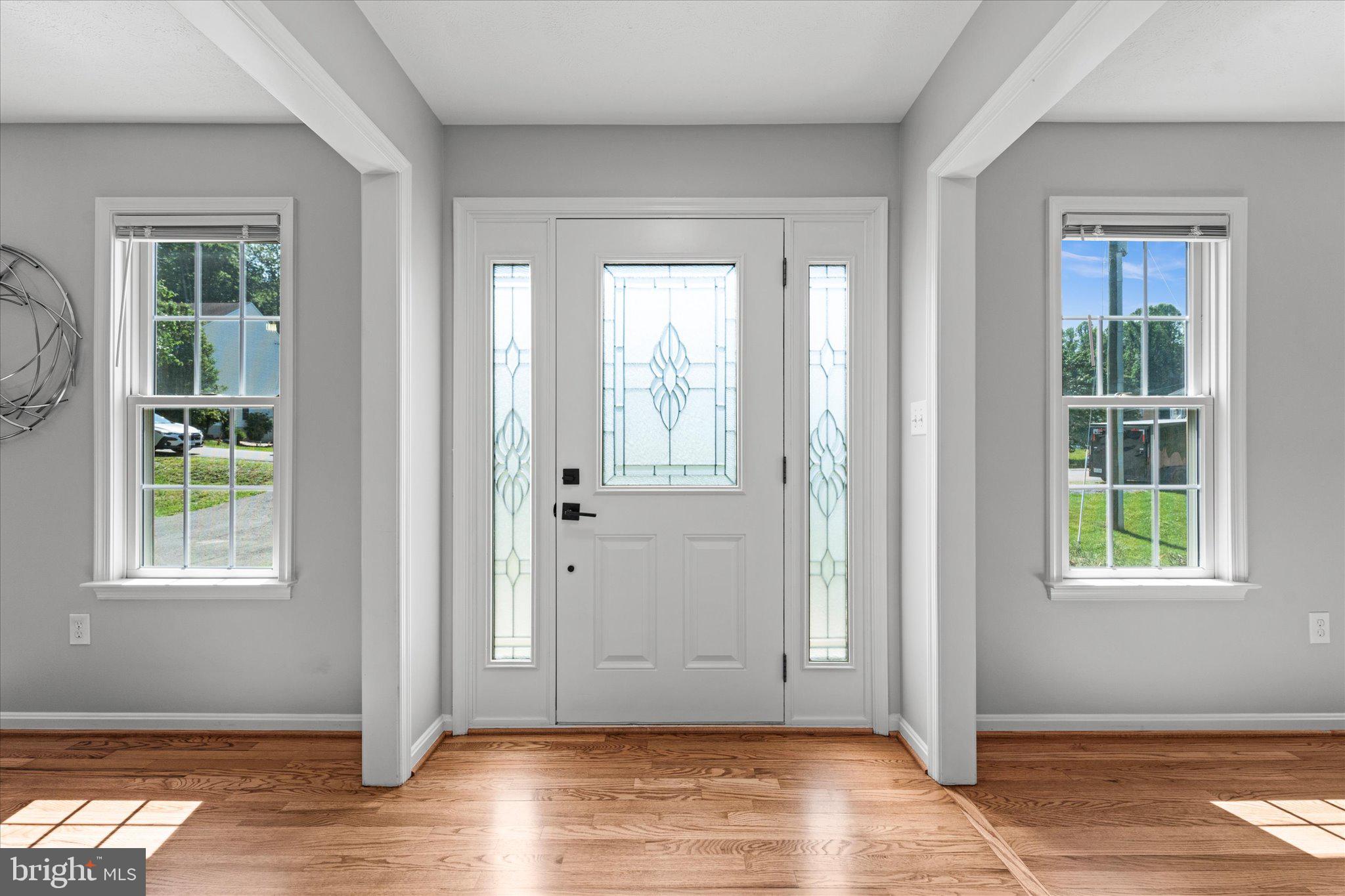 9040 Mullen Road King George, VA 22485 - Photo 2 of 61 Sun drenched foyer w/newly stained hardwood floors