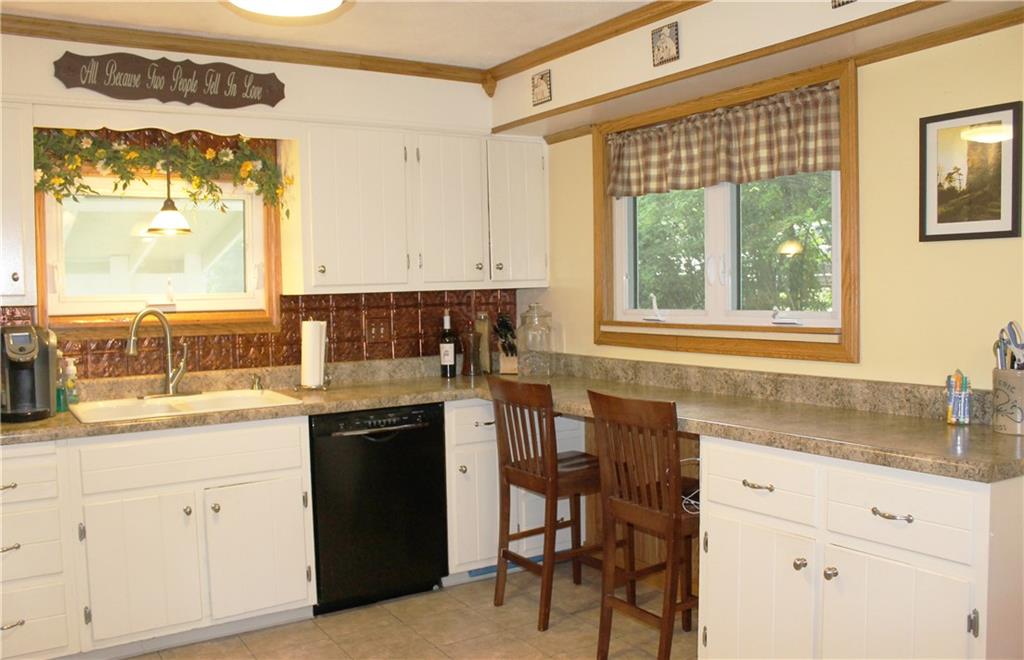 The stools provide for an adorable & convenient breakfast nook...